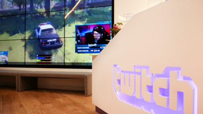 A wall of video monitors with real-time video game play is seen at the offices of Twitch Interactive