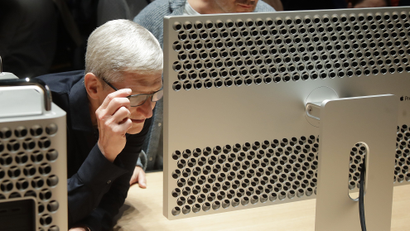 Tim Cook looking at the Mac Pro.