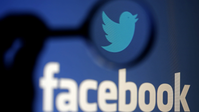 A logo of Twitter is pictured next to the logo of Facebook in this illustration photo in Sarajevo