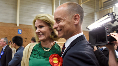Danish Prime Minister Helle Thorning-Schmidt celebrates with her husband Stephen Kinnock as he is elected the Member of Parliament for the Aberavon Constituency in the Neath Sports Centre, Neath, South Wales, May 8, 2015.