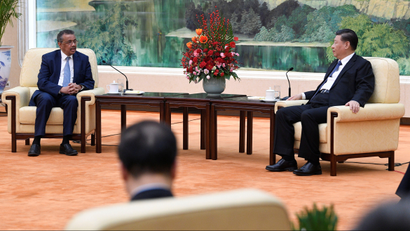 Tedros Adhanom, director general of the World Health Organization, meets with Chinese President Xi jinping before a meeting at the Great Hall of the People in Beijing, China, January 28, 2020.