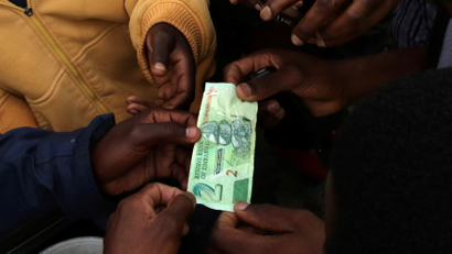 Zimbabwe begins to use bond notes as money despite public anxiety and fears of currency devaluation