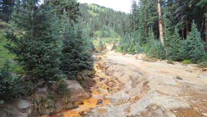 Yellow mine waste water from the Gold King Mine is seen in San Juan County, Colorado, in this picture released by the Environmental Protection Agency (EPA) taken August 7, 2015.