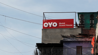 The logo of OYO, India's largest and fastest-growing hotel chain, is seen installed on a hotel building in New Delhi