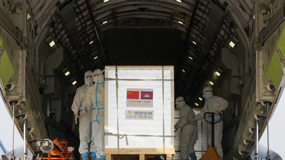 A shipment of 600,000 doses of COVID-19 vaccines donated by China arrives at the Phnom Penh International Airport