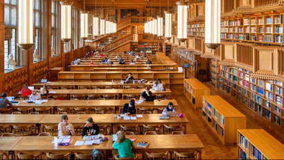 Students sit in the library of the university KU Leuven "Katholieke Universiteit Leuven" in Leuven