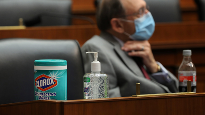 Clorox wipes and hand sanitiser available for members of the House Committee on Education and Labor are pictured during a congressional hearing.