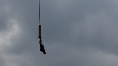 A man on a bungee rope