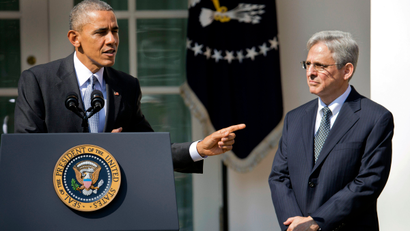 Federal appeals court judge Merrick Garland, stands with President Barack Obama as he is introduced as Obama's nominee for the Supreme Court during an announcement in the Rose Garden of the White House, in Washington, Wednesday, March 16, 2016.