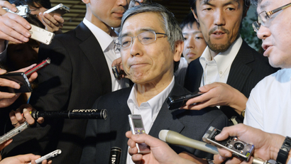 TOKYO, Japan - Bank of Japan chief Haruhiko Kuroda speaks to the press at the prime minister's office in Tokyo on June 13, 2013, after meeting with Prime Minister Shinzo Abe to discuss economic conditions and recent volatility in equity and foreign exchange markets. (Kyodo via AP Images