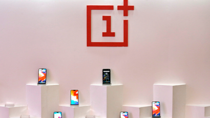OnePlus mobile phones are seen on display during a press briefing in Mumbai
