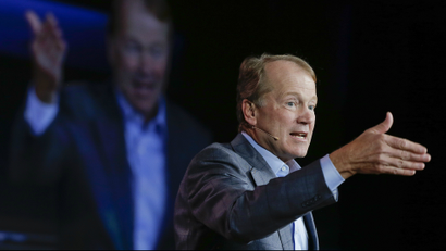 Cisco chairman and CEO John Chambers speaks delivers a keynote address at the International Consumer Electronics Show, Tuesday, Jan. 7, 2014, in Las Vegas. (AP Photo/Julie Jacobson)