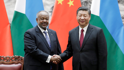 Chinese President Xi Jinping shakes hands with Djibouti's President Ismail Omar Guelleh during a signing ceremony at the Great Hall of the People in Beijing, China November 23, 2017.