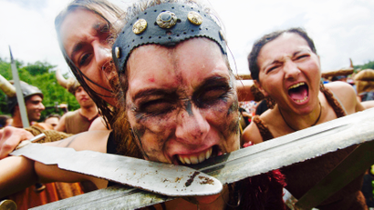 Women dressed as Vikings take part in the annual Viking festival of Catoira in Spain.