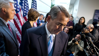 Speaker of the House Rep. John Boehner, R-Ohio, walks away from the microphone during a news conference after a House GOP meeting on Capitol Hill on Tuesday, Oct. 15, 2013 in Washington. House GOP leaders Tuesday pitched a plan to fellow Republicans to counter an emerging Senate deal to reopen the government and forestall an economy-rattling default on U.S. obligations. But they stopped short of promising a vote later in the day after the plan got mixed reviews from the rank and file.