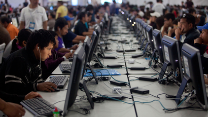 People of all ages surf the web at the Digital Village in Mexico City, Friday, July 17, 2015. With more than 1500 hundred computers and tablets available for the public, the Digital Village, organized by a Mexican telecommunications company, offers free high speed broadband internet access and skills training aims to increase digital inclusion in Mexico, according to organizers. (AP Photo/Sofia Jaramillo)