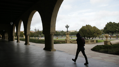 A student walks on campus at Stanford University.