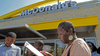 Rosaland Hemphill, 48, of Atlanta, fills out a job application at an Atlanta McDonald's restaurant Tuesday, April 19, 2011. McDonald's hopes to hire 50,000 new workers nationwide on April 19, 2011. (AP Photo/John Bazemore