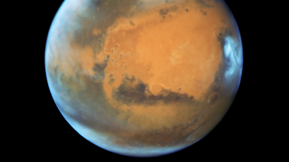 This May 12, 2016 image provided by NASA shows the planet Mars. A study published Wednesday, July 25, 2018 in the journal Science suggests a huge lake of salty water appears to be buried deep in Mars, raising the possibility of finding life on the red planet.