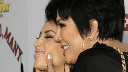 Kim Kardashian poses Kris Jenner