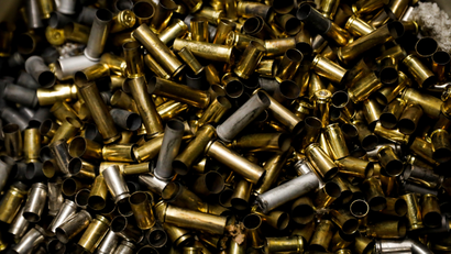 Discarded bullet shell cases are seen at Master Class Shooting Range in Monroe, New York, USA
