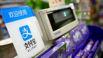 An Alipay logo is seen at a cashier in Shanghai January 12, 2017.