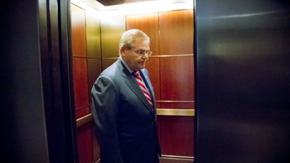 Senate Foreign Relations Chairman Sen. Robert Menendez, D-N.J., steps into an elevator on Capitol Hill in Washington, Wednesday, Sept. 4, 2013, as he heads to a closed-doort briefing for senators with Secretary of State John Kerry and intelligence officials as President Barack Obama seeks congressional authorization for military intervention in Syria.