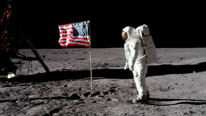Buzz Aldrin poses for a photograph beside the deployed United States flag on the moon