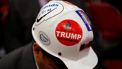 A West Virginia delegate wears a Trump sticker on his hard hat during the second day of the Republican National Convention in Cleveland