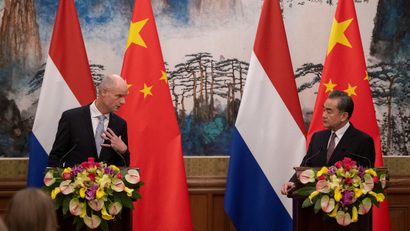 Netherlands Minister of Foreign Affairs Stef Blok speaks during a news conference next to China's Foreign Minister Wang Yi
