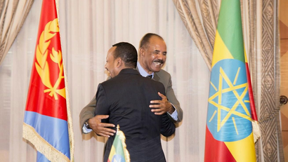 Ethiopia's Prime Minister Abiy Ahmed and Eritrean President Isaias Afwerk embrace at the declaration signing in Asmara, Eritrea July 9, 2018 in this photo obtained from social media on July 10, 2018.