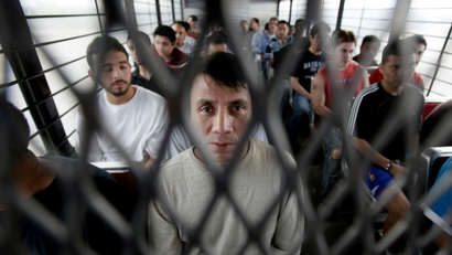 Mexican immigrant Bernardo Ortega Guerrero sits on a deportation buss in Texas in Chicago, Il., Wednesday, May 26, 2010.