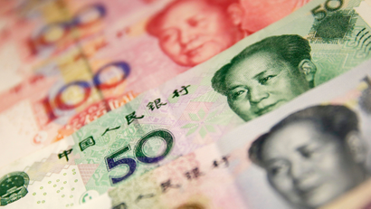 Chinese yuan or renminbi (RMB) notes in Beijing, China, 29 December 2015.