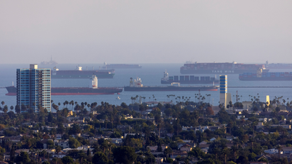 A number of large container ships float in California's San Pedro Bay.