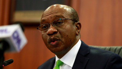 Nigeria's central bank governor Godwin Emefiele appears to be speaking at a press event.