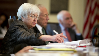 Federal Reserve Chair Janet Yellen, from left, with Vice Chairman Stanley Fischer, and Gov. Daniel Tarullo, and the Board of Governors of the Federal Reserve System presides over a meeting in Washington, DC.