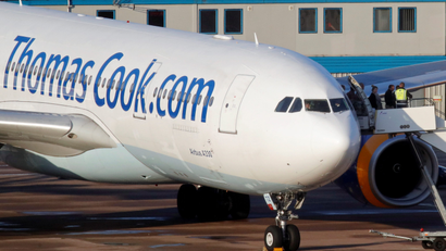 A grounded airplane with the Thomas Cook livery is seen at Manchester Airport