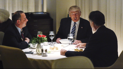 U.S. President-elect Donald Trump sits at a table for dinner with former Massachusetts Governor Mitt Romney (R) and his choice for White House Chief of Staff Reince Priebus (L) at Jean-Georges at the Trump International Hotel &amp; Tower in New York, U.S., November 29, 2016.
