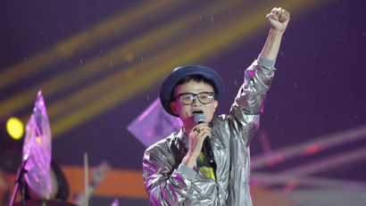 Alibaba founder Jack Ma gestures as he sings a song during celebration of the 10th anniversary of Taobao Marketplace, China's largest consumer-focused e-commerce website, in Hangzhou, May 10, 2013. Jonathan Lu was officially appointed as CEO of Alibaba Group on Friday as Ma stepped down. Picture taken May 10, 2013. REUTERS/China Daily