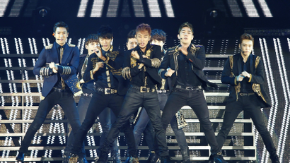 Members of the South Korean K-Pop group Super Junior perform during their show, part of their Super Show 5 tour, in Lima April 27, 2013. REUTERS/Enrique Castro-Mendivil (PERU - Tags: ENTERTAINMENT) - RTXZ2DM