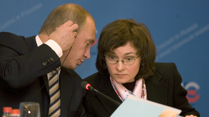Russian Prime Minister Vladimir Putin speaking with Central Bank of Russia governor Elvira Nabiullina