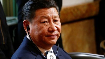 Chinese President Xi Jinping listensto a speech of Swiss President Leuthard at at the Bundeshaus in Bern