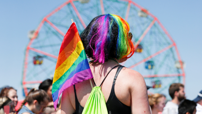 woman with LGBT flag