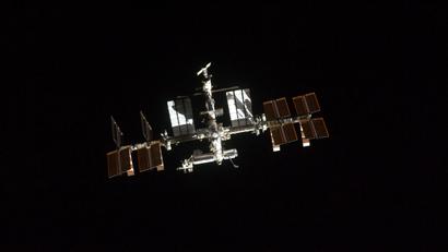 This is one of a series of images showing the International Space Station photographed by a crewmember onboard the space shuttle Atlantis as the two spacecraft performed rendezvous and docking operations on the STS-135 mission's third day in Earth orbit.