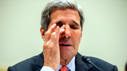 Secretary of State John Kerry pauses while testifying on Capitol Hill in Washington, Washington, Tuesday, July 28, 2015, before the committee's hearing on the Iran Nuclear Agreement. Kerry warned that if they vote to disapprove the nuclear deal negotiated with Iran, Tehran will move forward toward an atomic bomb, international sanctions will crumble and the U.S. will be left without with any of the access and inspections that are part of the deal.