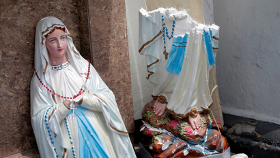A statue of Virgin Mary in front of the St. Anthony's Shrine, Kochchikade church after an explosion in Colombo, Sri Lanka.
