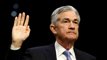 Chair Jerome Powell raises his right hand as he prepares to testify on his nomination in 2017.