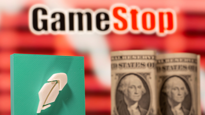 A 3d printed Robinhood logo and one dollar banknotes are seen in front of displayed GameStop logo in this illustration.