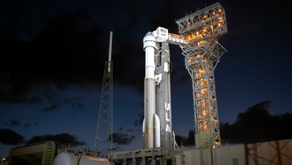 A United Launch Alliance Atlas V rocket with Boeing's CST-100 Starliner spacecraft onboard is seen illuminated by spotlights on the launch pad at Space Launch Complex 41 ahead of the Orbital Flight Test mission, Wednesday, Dec. 18, 2019 at Cape Canaveral Air Force Station in Florida. Boeing's shiny new Starliner crew capsule makes its debut this week with a launch to the International Space Station, the company's last hurdle before flying astronauts for NASA next year.