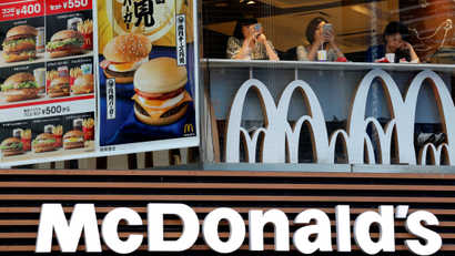 Customers are seen at a McDonald's fast food restaurant in Tokyo